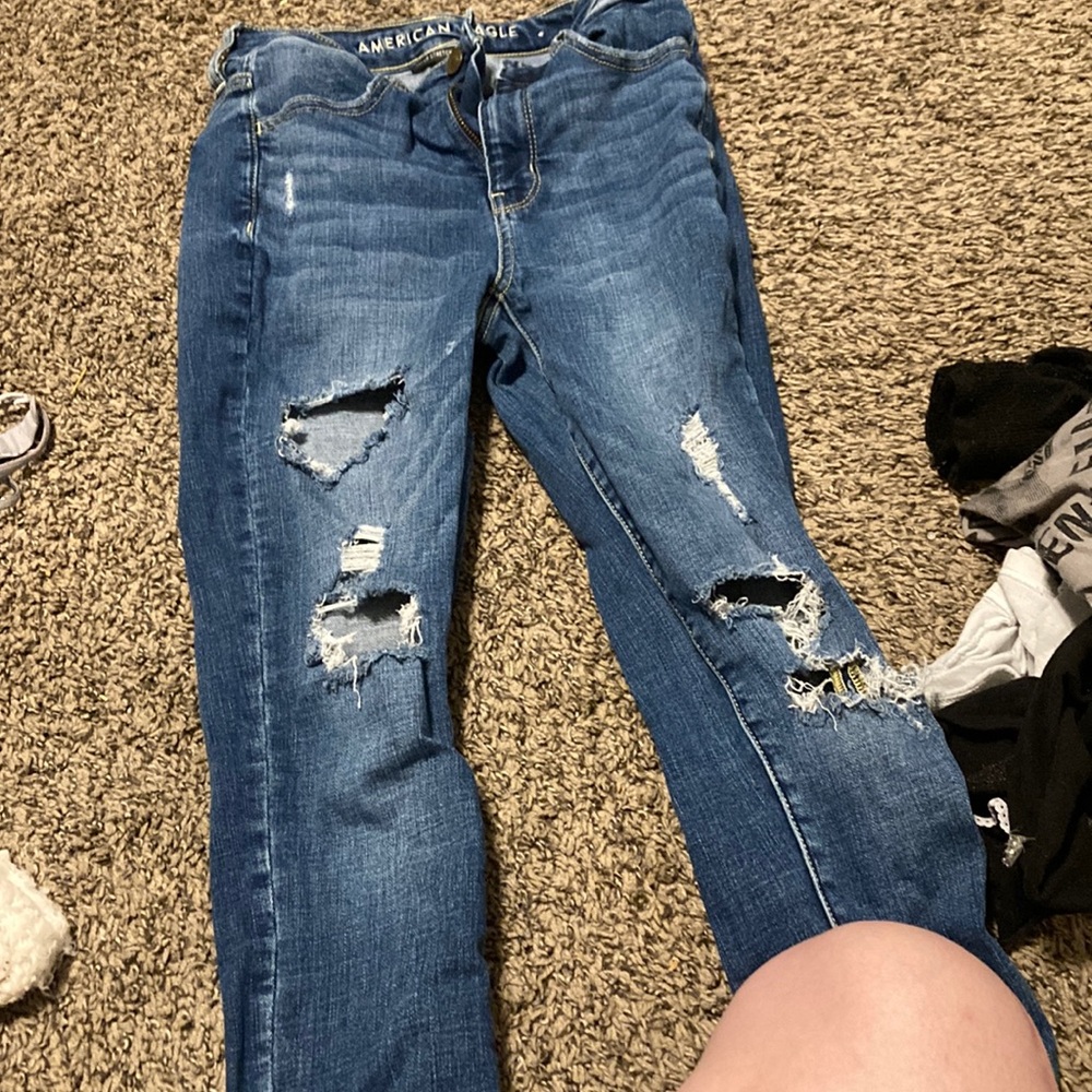 Blue skinny jeans with holes